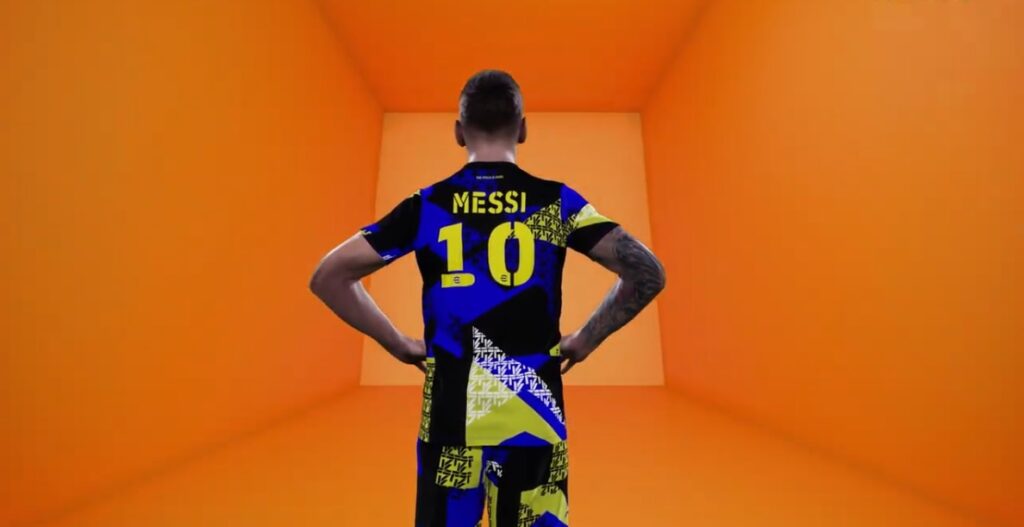 eFootball 2025 lionel Messi standing in front of an orange wall